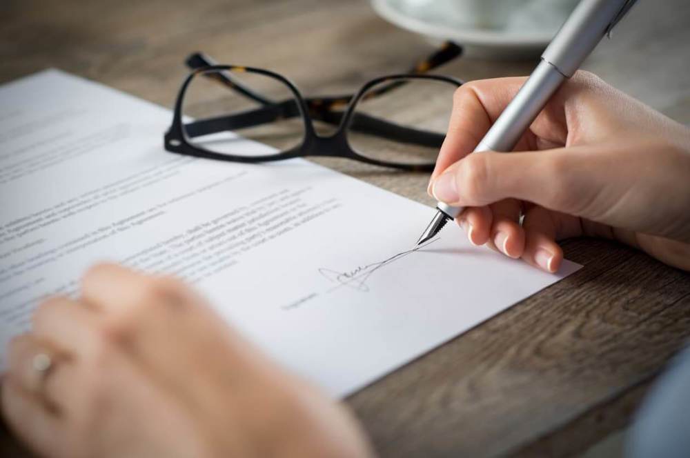 Person signing document